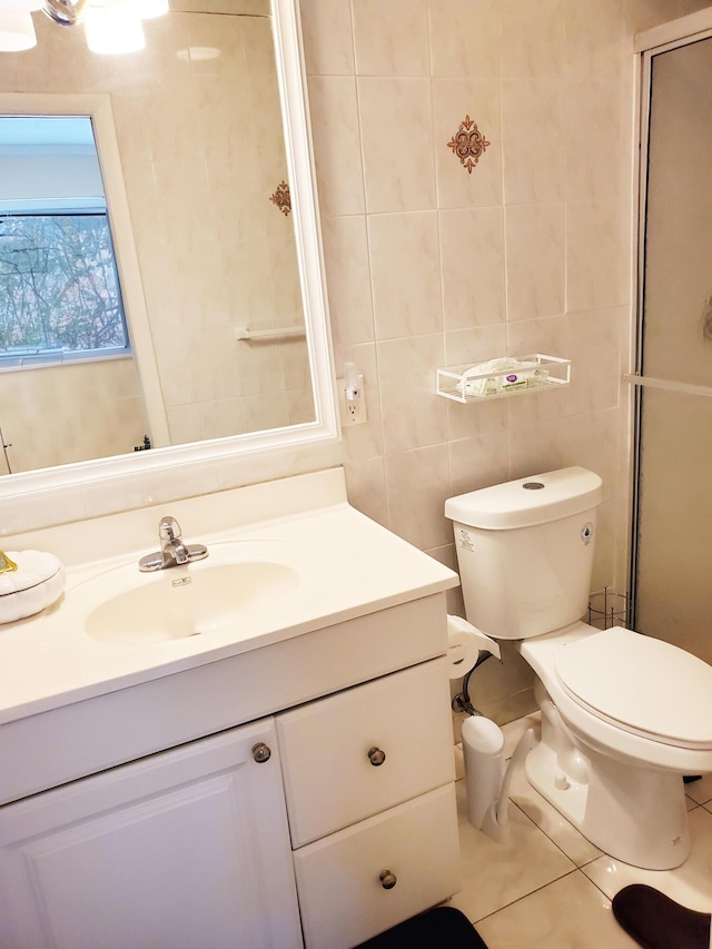 708 Laconia Cir Unit 708, Lake Worth, FL 33467 - bathroom with tile walls, vanity, tile patterned flooring, and toilet