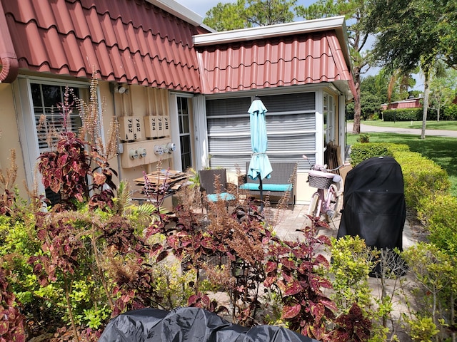 708 Laconia Cir Unit 708, Lake Worth, FL 33467 - view of side of home with mansard roof