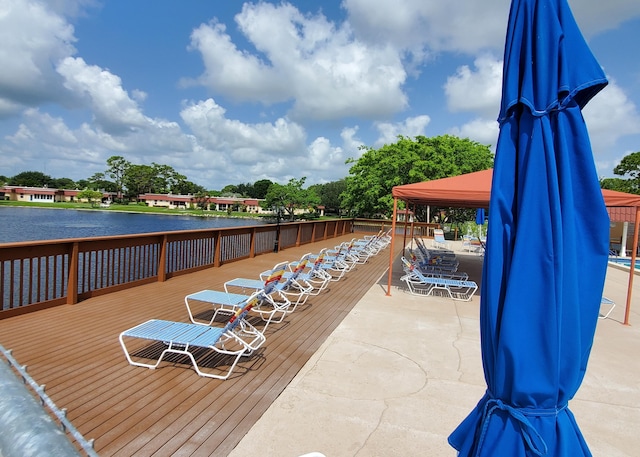 708 Laconia Cir Unit 708, Lake Worth, FL 33467 - wooden terrace featuring a gazebo and a water view