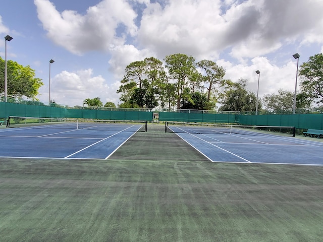 708 Laconia Cir Unit 708, Lake Worth, FL 33467 - view of tennis court featuring community basketball court