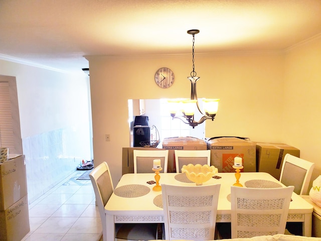 708 Laconia Cir Unit 708, Lake Worth, FL 33467 - dining space featuring a chandelier and crown molding