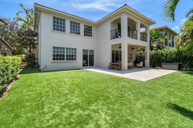 1522 Carafe Ct, Palm Beach Gardens, FL 33410 - back of property featuring stucco siding, a balcony, ceiling fan, and a patio area