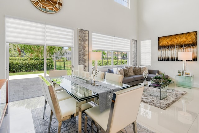 1522 Carafe Ct, Palm Beach Gardens, FL 33410 - dining room with a towering ceiling and tile patterned flooring
