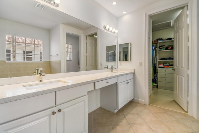 1522 Carafe Ct, Palm Beach Gardens, FL 33410 - full bath featuring double vanity, tile patterned flooring, a spacious closet, and recessed lighting