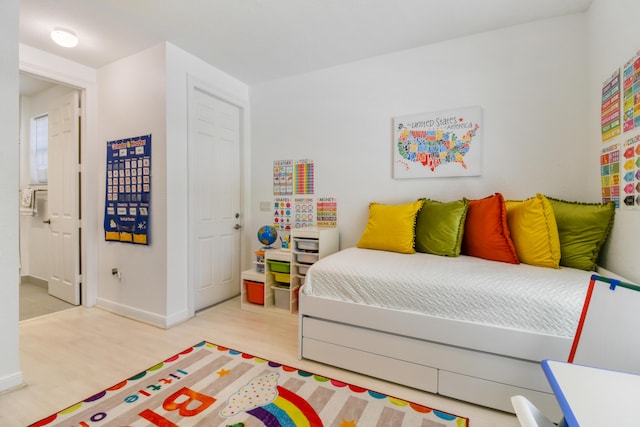 1522 Carafe Ct, Palm Beach Gardens, FL 33410 - bedroom featuring wood finished floors and baseboards