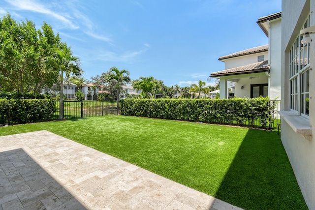 1522 Carafe Ct, Palm Beach Gardens, FL 33410 - view of yard with a patio and a residential view