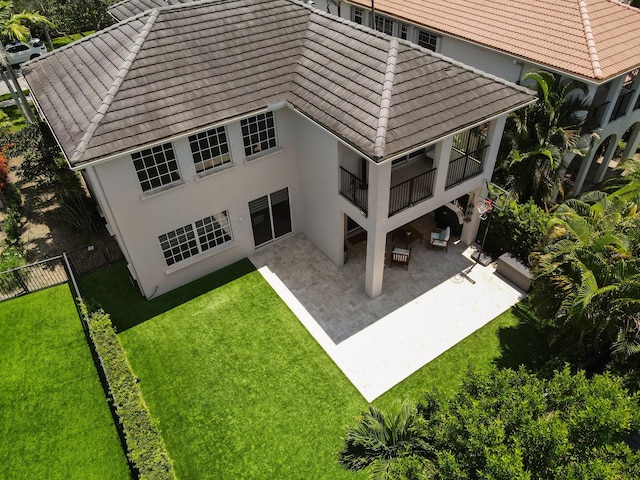 1522 Carafe Ct, Palm Beach Gardens, FL 33410 - rear view of property with a patio, a balcony, a tiled roof, and stucco siding