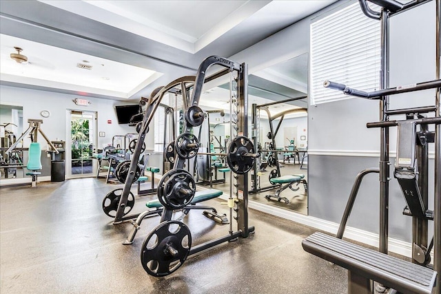 1522 Carafe Ct, Palm Beach Gardens, FL 33410 - workout area with baseboards and a tray ceiling