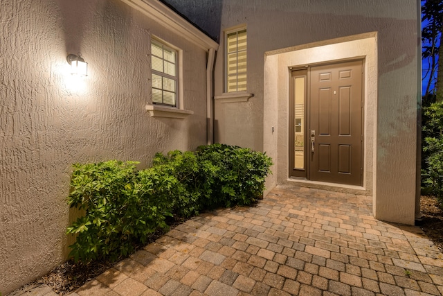 1522 Carafe Ct, Palm Beach Gardens, FL 33410 - entrance to property with stucco siding
