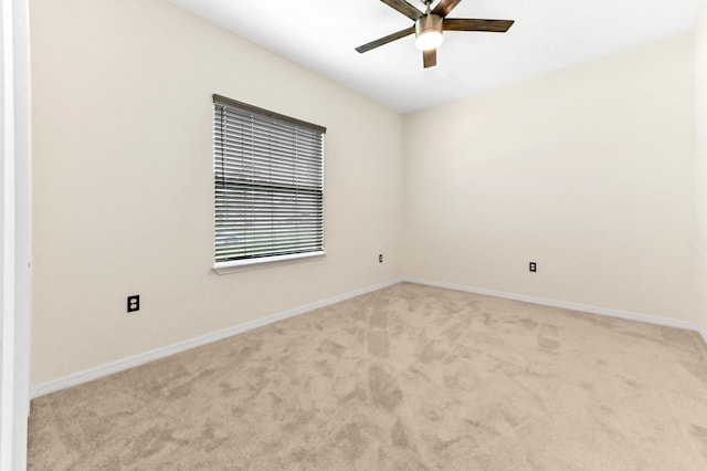 6700 NW Omega Rd, Port Saint Lucie, FL 34983 - empty room with light colored carpet, ceiling fan, and baseboards
