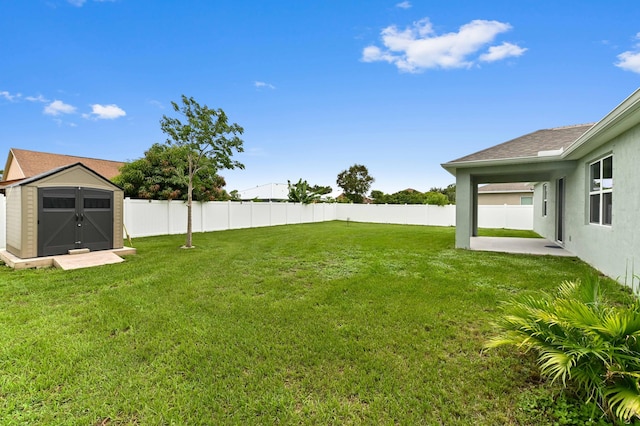6700 NW Omega Rd, Port Saint Lucie, FL 34983 - view of yard with a patio