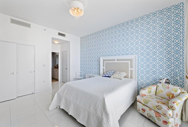 550 Okeechobee Blvd Unit Uph-15, West Palm Beach, FL 33401 - bedroom featuring wallpapered walls and light tile patterned floors
