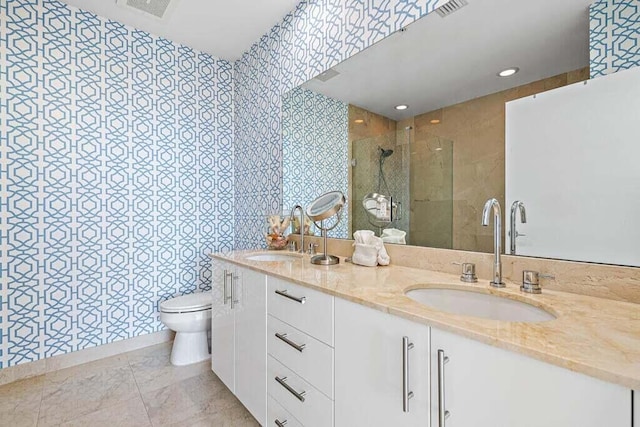 550 Okeechobee Blvd Unit Uph-15, West Palm Beach, FL 33401 - bathroom with toilet, a stall shower, double vanity, marble finish floors, and wallpapered walls
