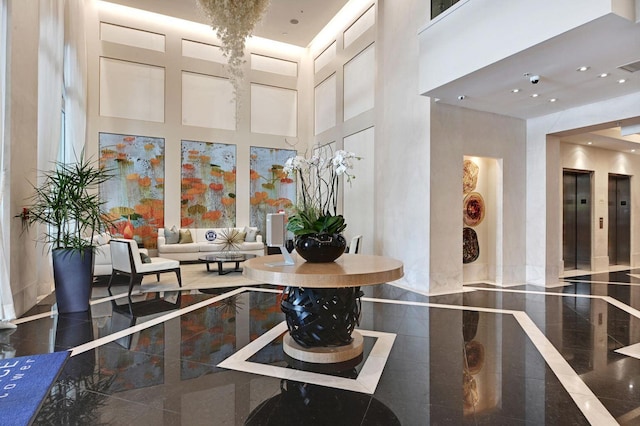 550 Okeechobee Blvd Unit Uph-15, West Palm Beach, FL 33401 - community lobby with a towering ceiling and recessed lighting