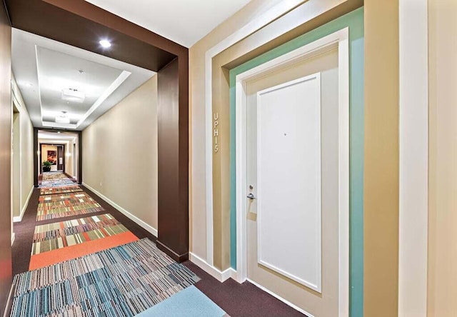 550 Okeechobee Blvd Unit Uph-15, West Palm Beach, FL 33401 - corridor featuring carpet floors, baseboards, and a raised ceiling