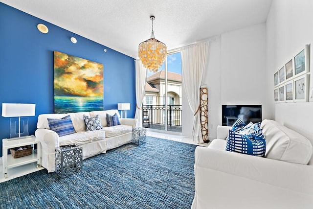 550 Okeechobee Blvd Unit Uph-15, West Palm Beach, FL 33401 - living area with a chandelier, carpet floors, and a textured ceiling