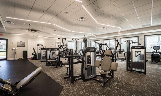 9759 Vitrail Ln, Delray Beach, FL 33446 - workout area featuring a paneled ceiling, carpet floors, and a ceiling fan