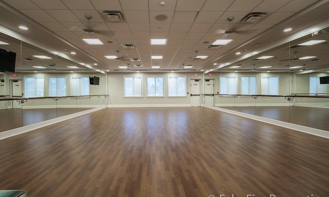 9759 Vitrail Ln, Delray Beach, FL 33446 - workout area featuring wood finished floors and a paneled ceiling