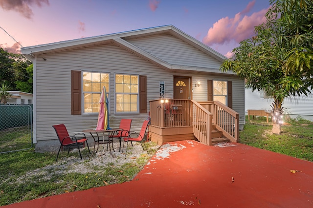 716 21st St, West Palm Beach, FL 33407 - rear view of property featuring a patio