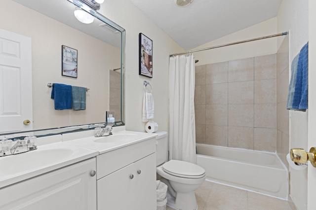 716 21st St, West Palm Beach, FL 33407 - full bath with double vanity, tile patterned floors, shower / tub combo, toilet, and vaulted ceiling
