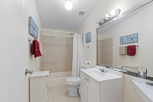 716 21st St, West Palm Beach, FL 33407 - full bathroom featuring vanity, toilet, shower / bathtub combination with curtain, tile patterned flooring, and a textured ceiling