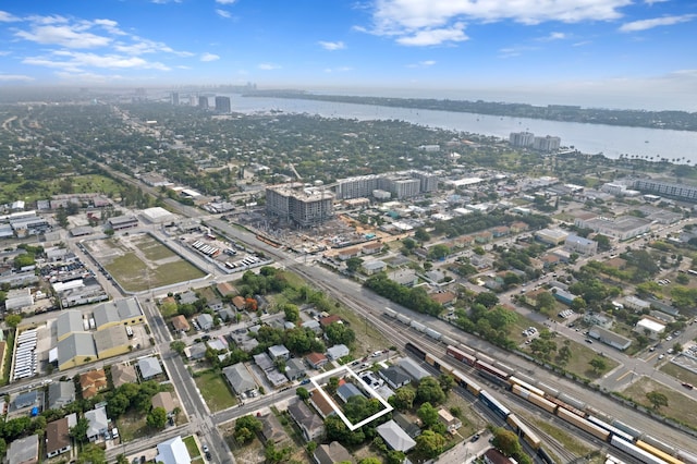 716 21st St, West Palm Beach, FL 33407 - view of property location with a large body of water, nearby urban area, property parcel outlined, and a major roadway