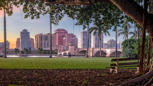716 21st St, West Palm Beach, FL 33407 - view of property's community with a skyline view, a yard, and a water view