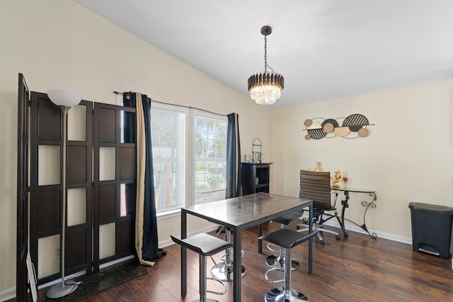 716 21st St, West Palm Beach, FL 33407 - dining area with baseboards, dark wood-style floors, a chandelier, and vaulted ceiling