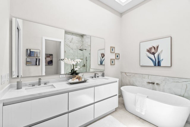 6357 Graycliff Dr Unit C, Boca Raton, FL 33496 - full bathroom featuring a marble finish shower, double vanity, and a freestanding bath
