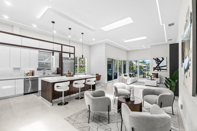 6357 Graycliff Dr Unit C, Boca Raton, FL 33496 - living area featuring recessed lighting and a skylight