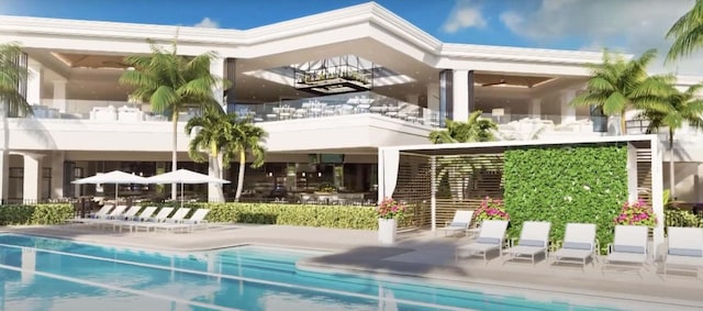 6357 Graycliff Dr Unit C, Boca Raton, FL 33496 - rear view of property featuring a community pool and a patio area