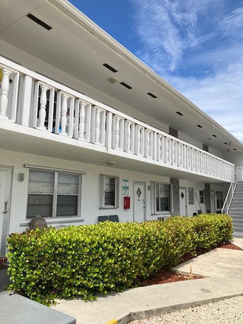 602 N H St Unit 1A, 2A, 3A, 5B, 7B, 8B, Lake Worth Beach, FL 33460 - view of home's exterior featuring stucco siding