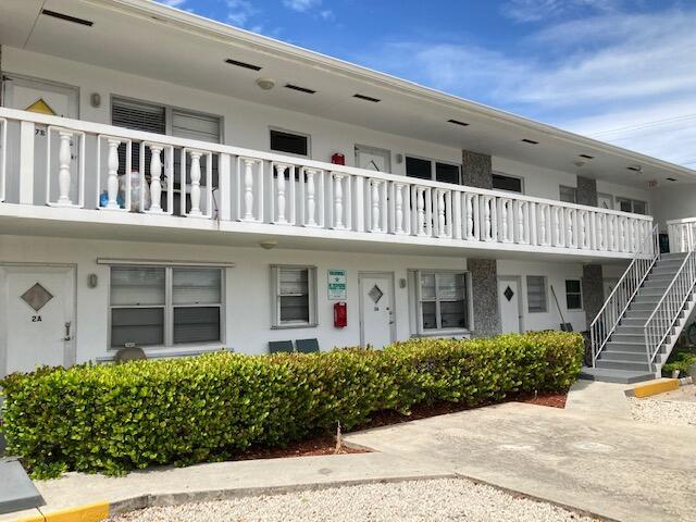 602 N H St Unit 1A, 2A, 3A, 5B, 7B, 8B, Lake Worth Beach, FL 33460 - view of property featuring stairway