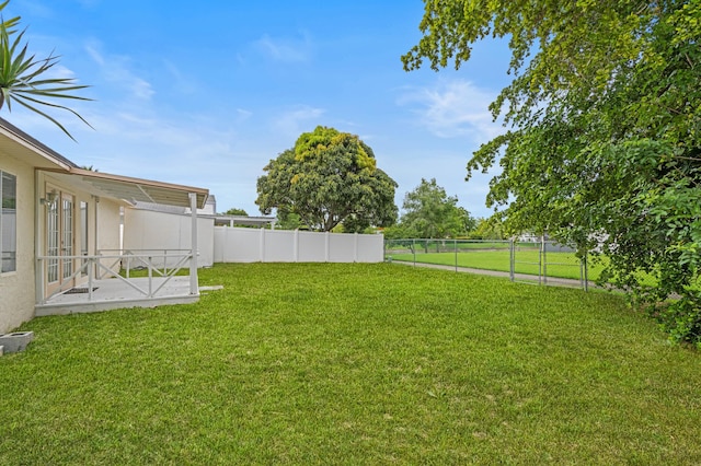23444 Shetland Run, Boca Raton, FL 33433 - view of yard featuring french doors