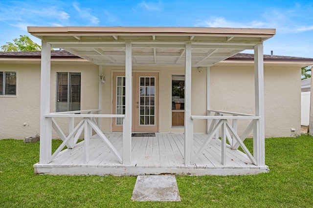 23444 Shetland Run, Boca Raton, FL 33433 - rear view of property with stucco siding and a lawn