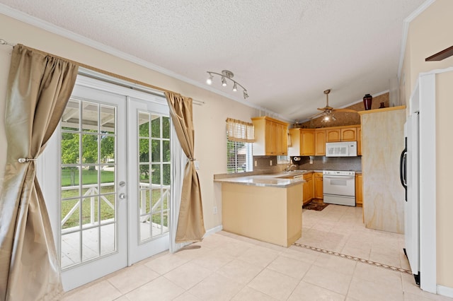 23444 Shetland Run, Boca Raton, FL 33433 - kitchen with white appliances, french doors, a peninsula, a sink, and ornamental molding