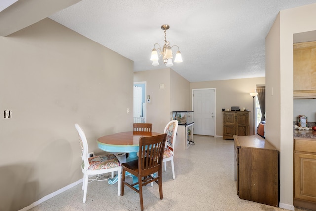 590 SE Anchor Ln, Port Saint Lucie, FL 34983 - dining room with a chandelier and a textured ceiling