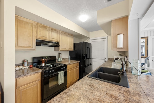 590 SE Anchor Ln, Port Saint Lucie, FL 34983 - kitchen featuring black appliances, under cabinet range hood, a textured ceiling, light brown cabinetry, and light countertops