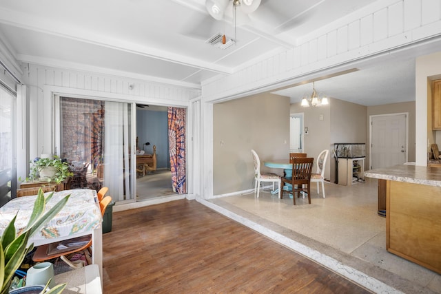 590 SE Anchor Ln, Port Saint Lucie, FL 34983 - dining room featuring a chandelier and baseboards