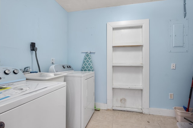 590 SE Anchor Ln, Port Saint Lucie, FL 34983 - laundry room with electric panel, independent washer and dryer, and light tile patterned floors