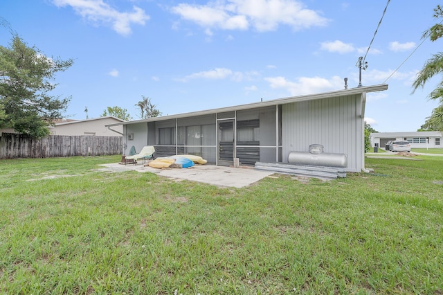 590 SE Anchor Ln, Port Saint Lucie, FL 34983 - back of house with a sunroom and a patio