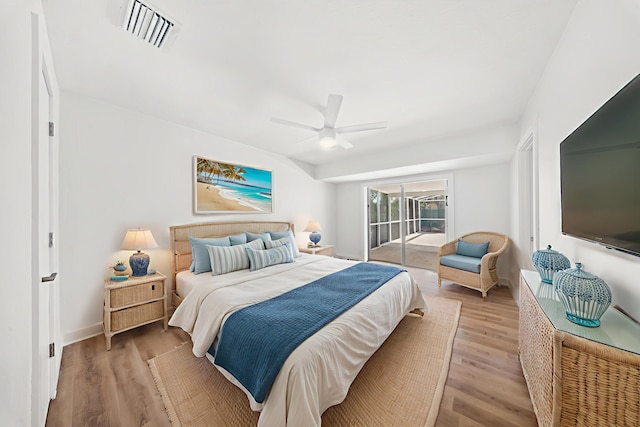 948 Canal Cir, Sebastian, FL 32958 - bedroom featuring access to exterior, light wood-style floors, and ceiling fan