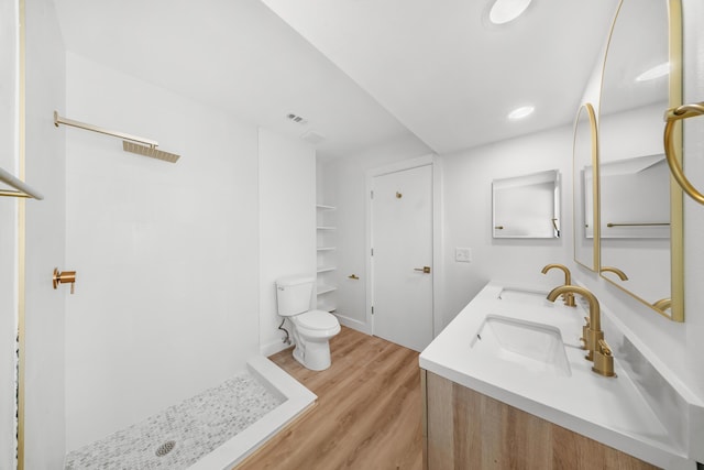 948 Canal Cir, Sebastian, FL 32958 - full bathroom with wood finished floors, double vanity, and a stall shower
