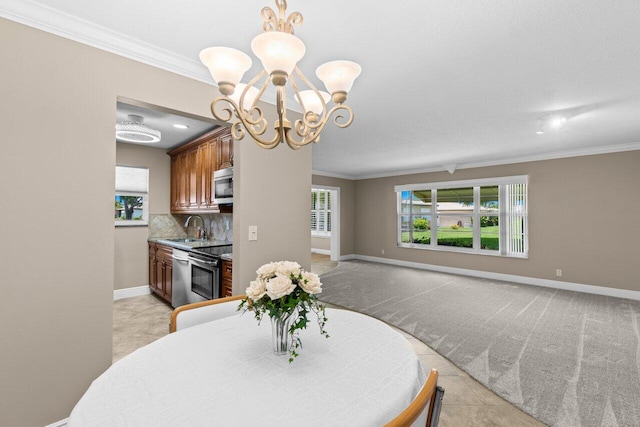 1012 Circle Ter E Unit A, Delray Beach, FL 33445 - dining space with a chandelier, crown molding, baseboards, and light carpet