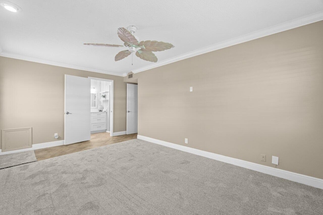 1012 Circle Ter E Unit A, Delray Beach, FL 33445 - spare room with ornamental molding, light colored carpet, a ceiling fan, and baseboards