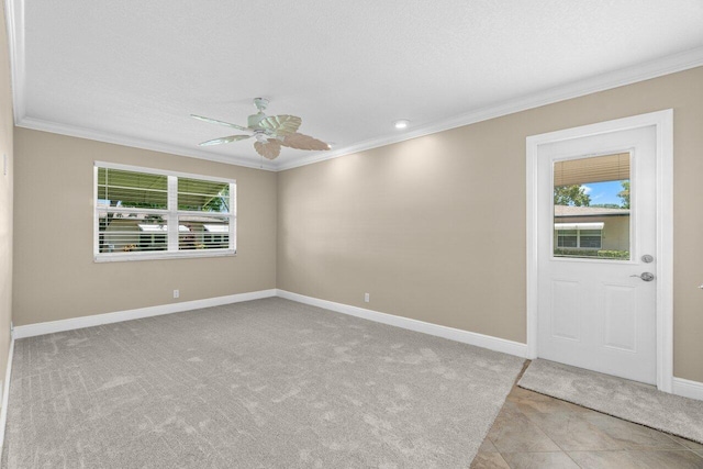 1012 Circle Ter E Unit A, Delray Beach, FL 33445 - carpeted spare room featuring ornamental molding, a ceiling fan, and baseboards
