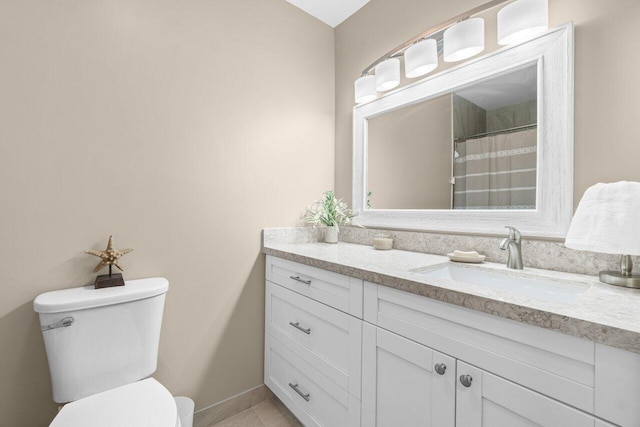 1012 Circle Ter E Unit A, Delray Beach, FL 33445 - bathroom with vanity, toilet, baseboards, and a shower with shower curtain
