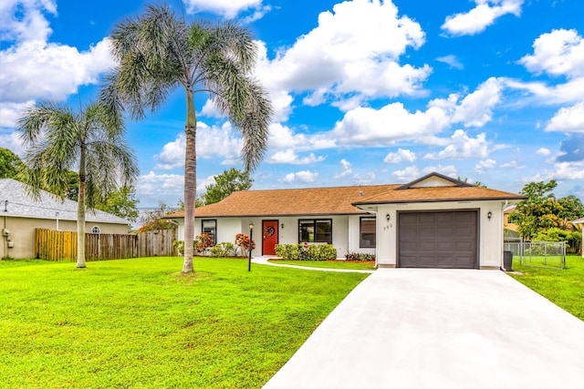 782 NW Kilpatrick Ave, Port Saint Lucie, FL 34983 - ranch-style home featuring concrete driveway, a garage, and stucco siding