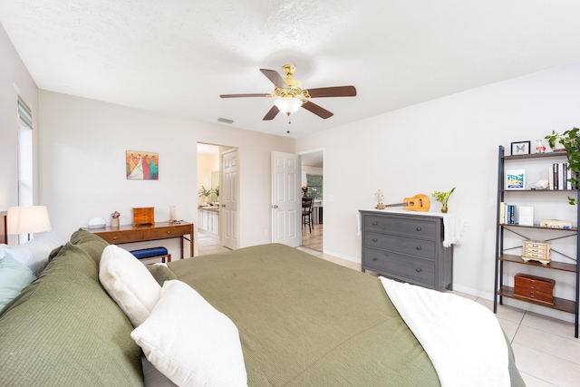 782 NW Kilpatrick Ave, Port Saint Lucie, FL 34983 - bedroom with light tile patterned floors, ceiling fan, and baseboards