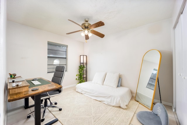 782 NW Kilpatrick Ave, Port Saint Lucie, FL 34983 - bedroom featuring a desk, a closet, baseboards, and ceiling fan